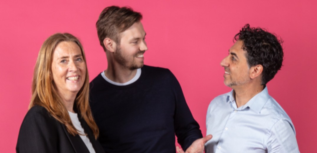 three colleagues talking